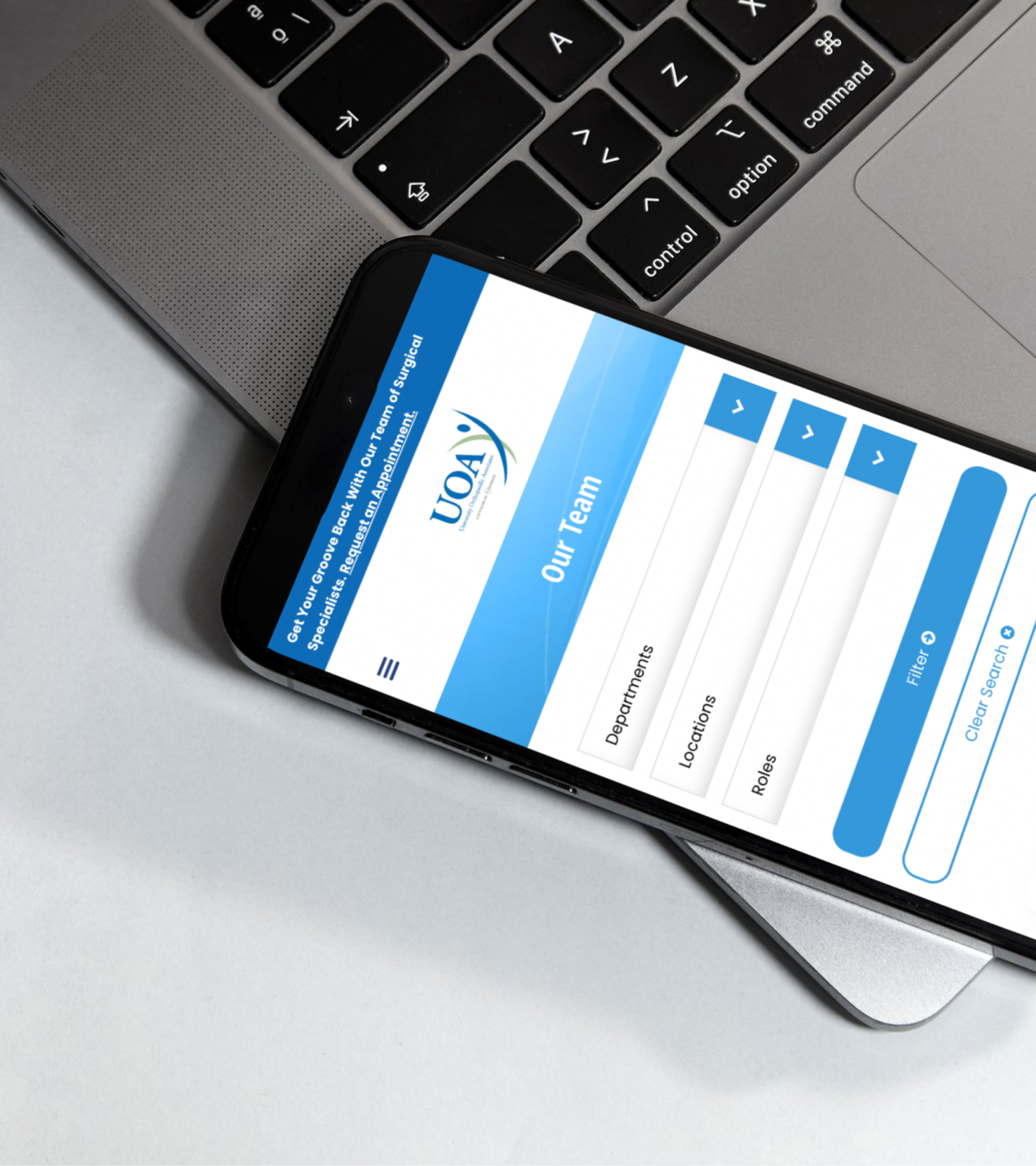 Mockup of the UOA website on a phone